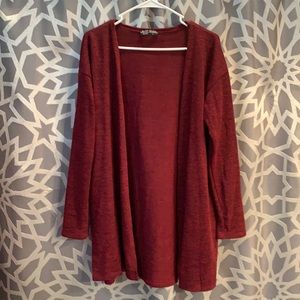 Long sleeved duster sweater.